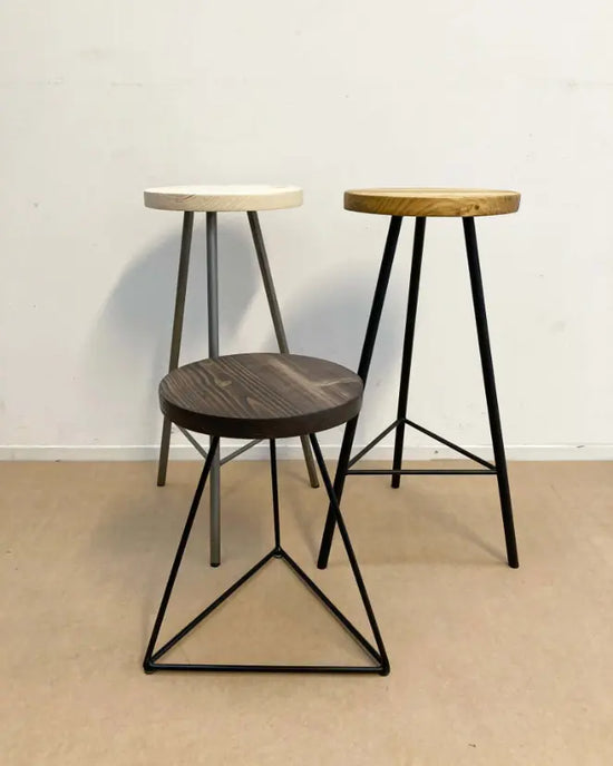wood stool seating set with optional bases.