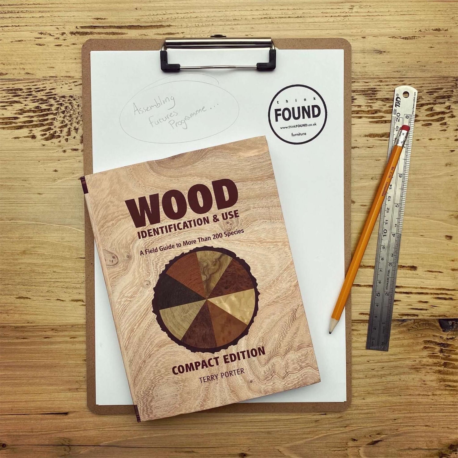 clipboard with wood leaflet.