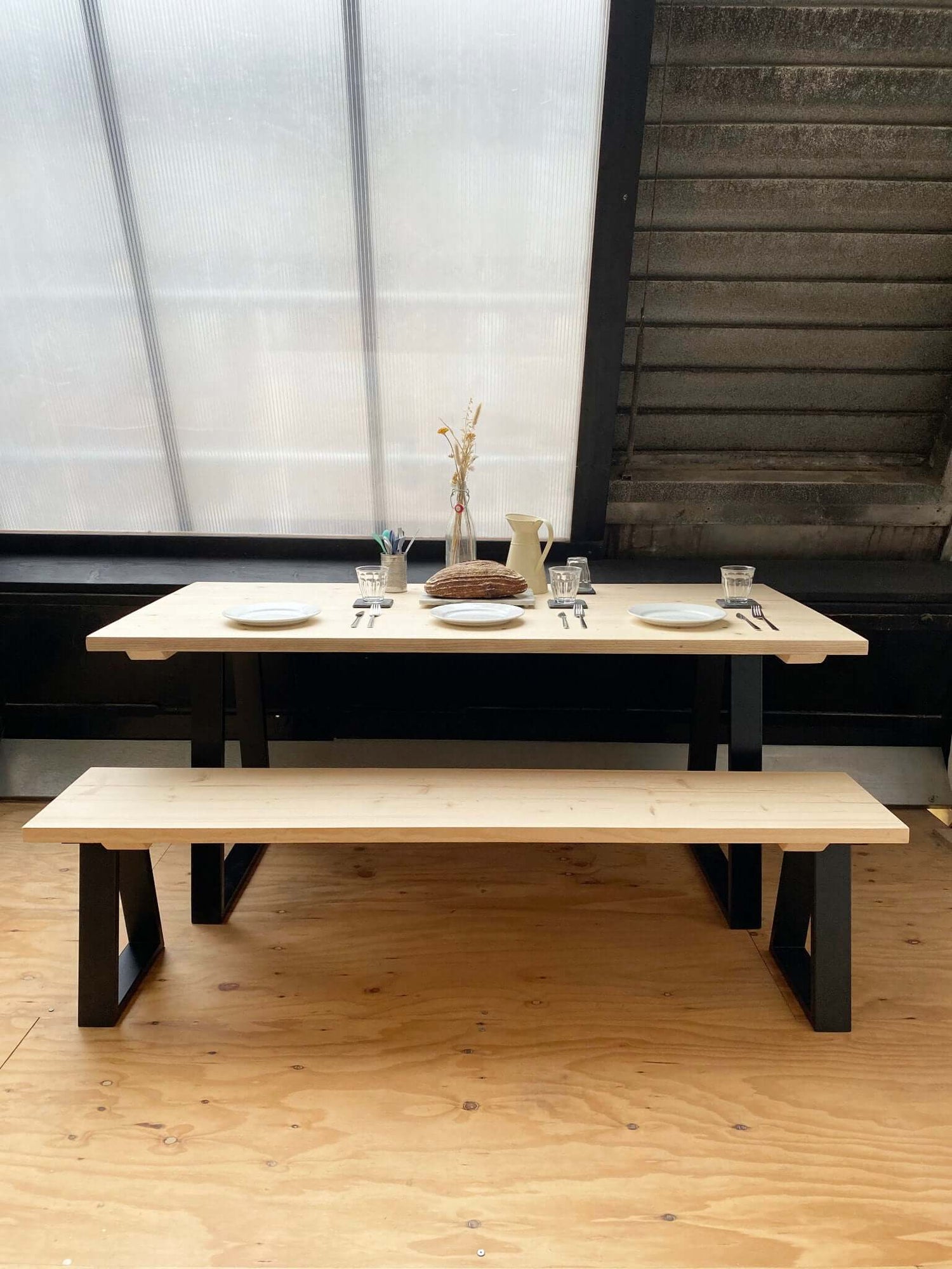 reclaimed wood dining table set with industrial style legs