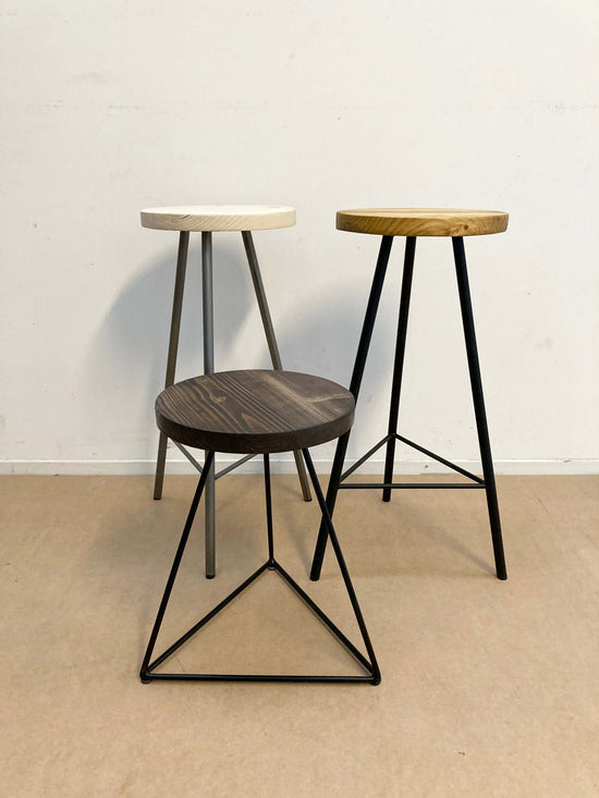 wood stool seating set with optional bases.