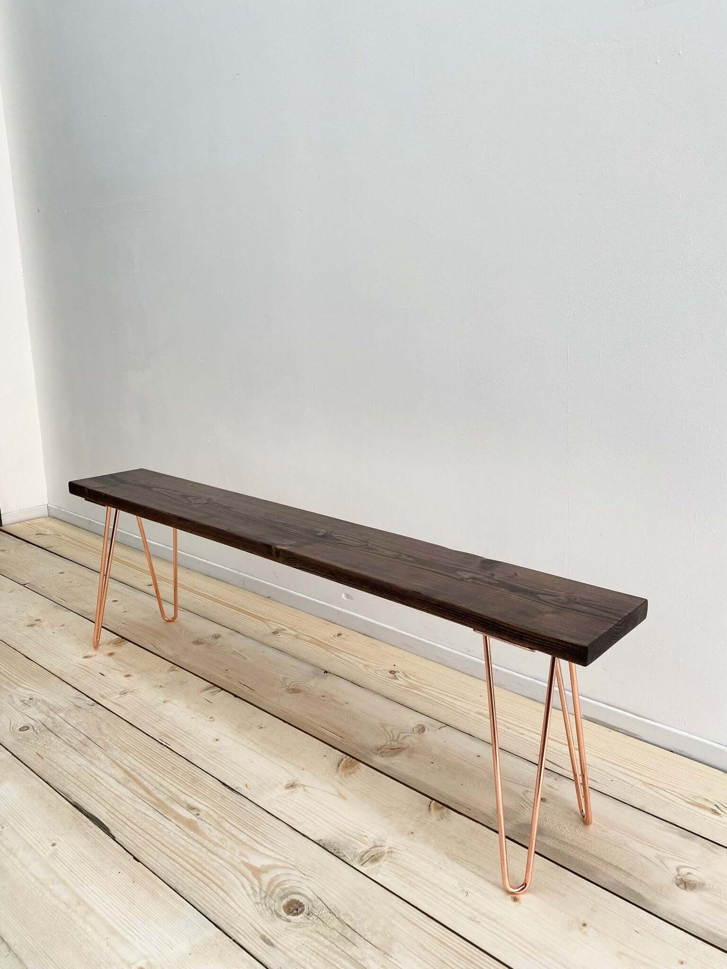 Reclaimed wood bench seat with hairpin legs.