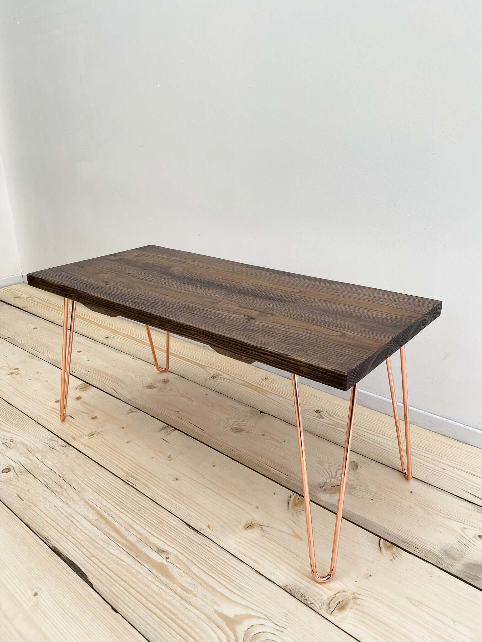 Reclaimed wood coffee table with hairpin legs.