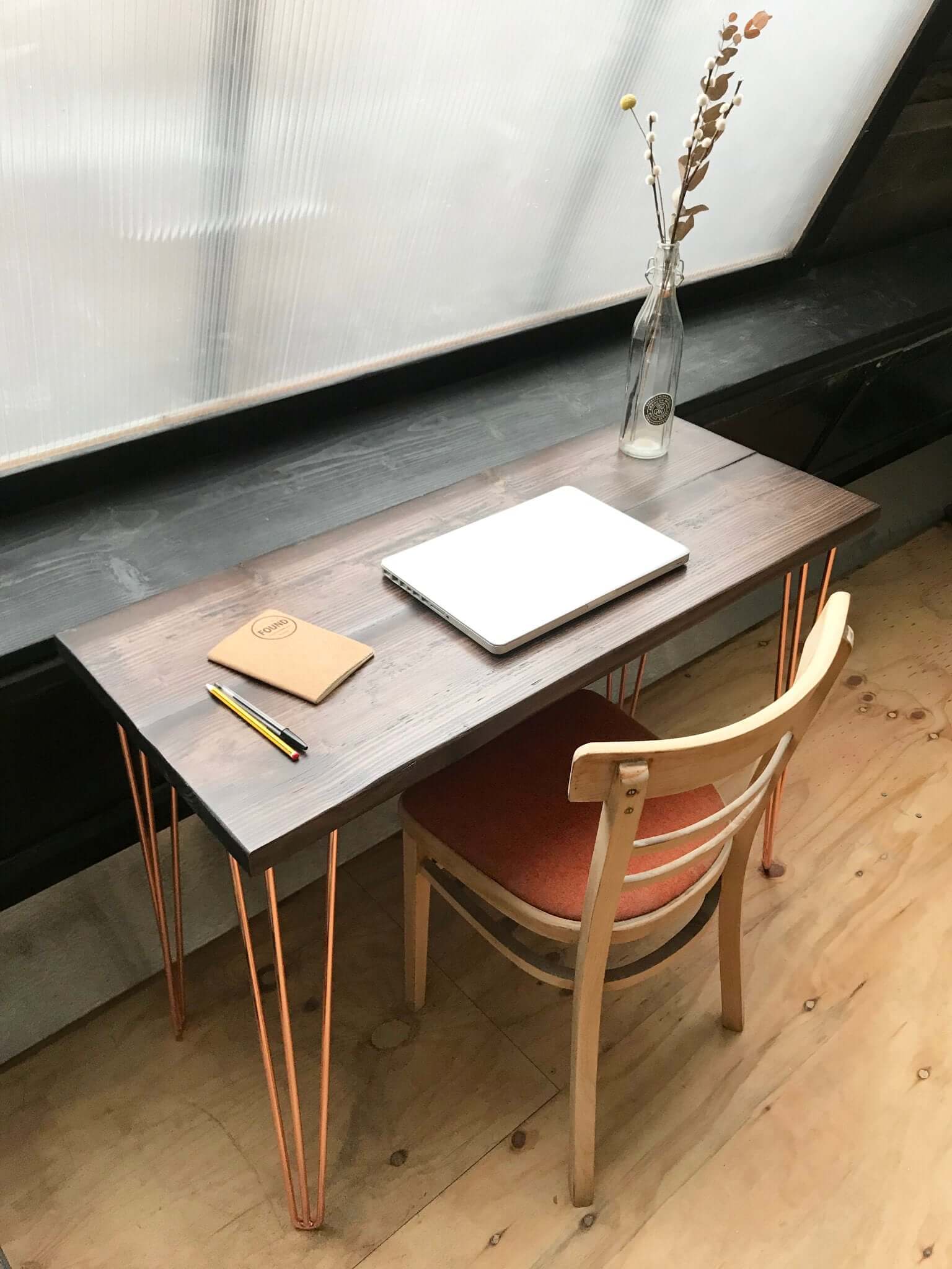 Reclaimed wood desk with hairpin legs.