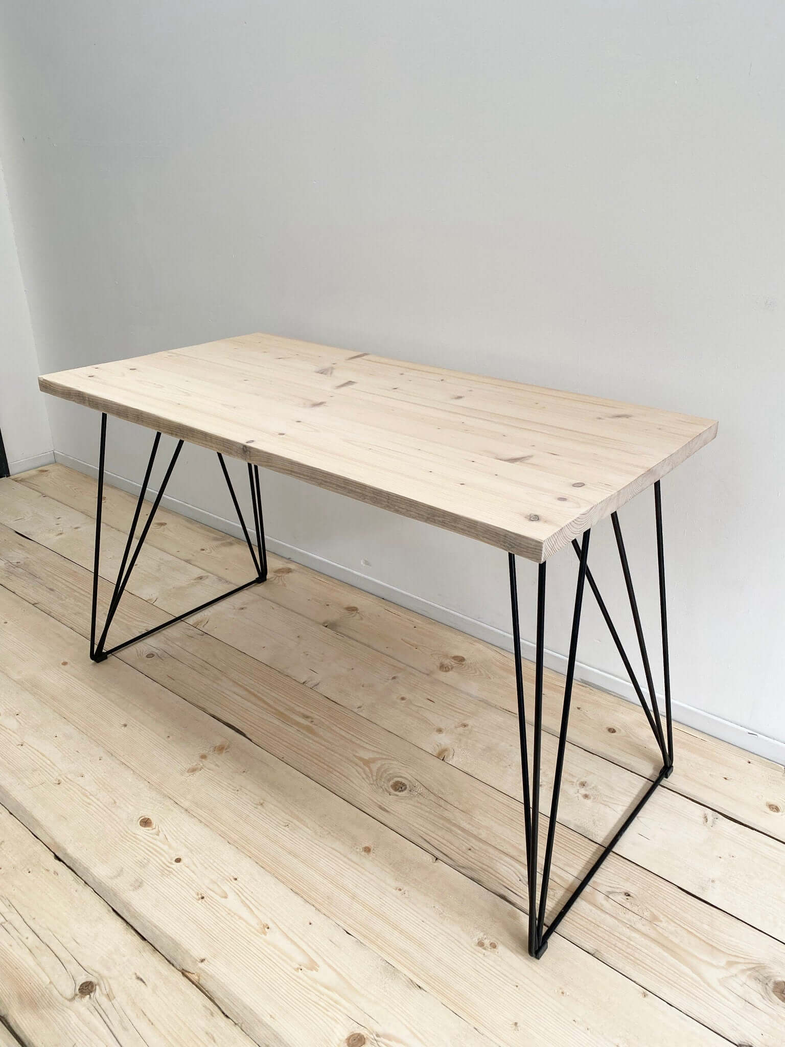 Reclaimed wood desk with industrial legs.