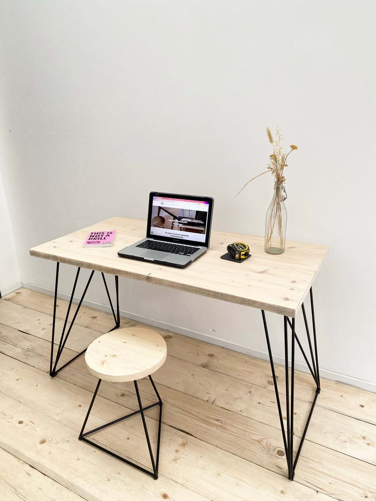 Reclaimed wood desk with industrial legs.