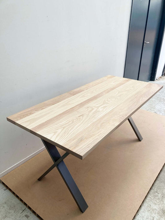 Hardwood large dining table with industrial legs.