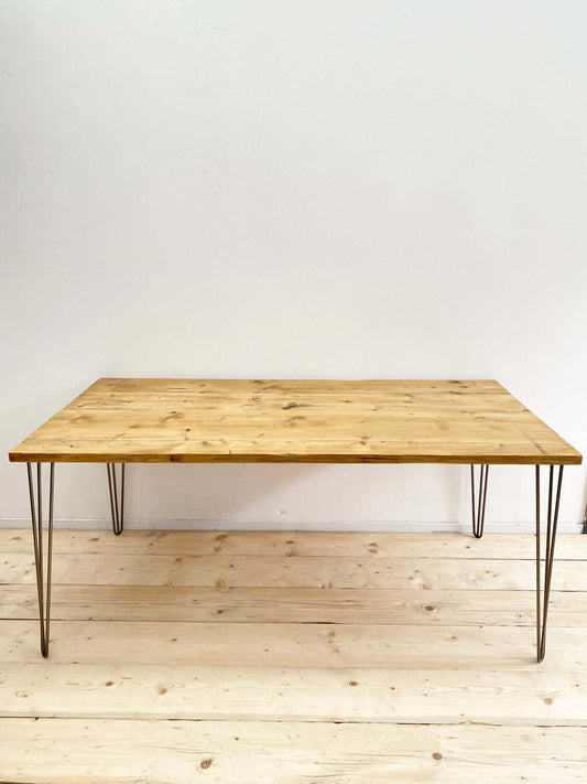 Reclaimed wood large dining table with hairpin legs.