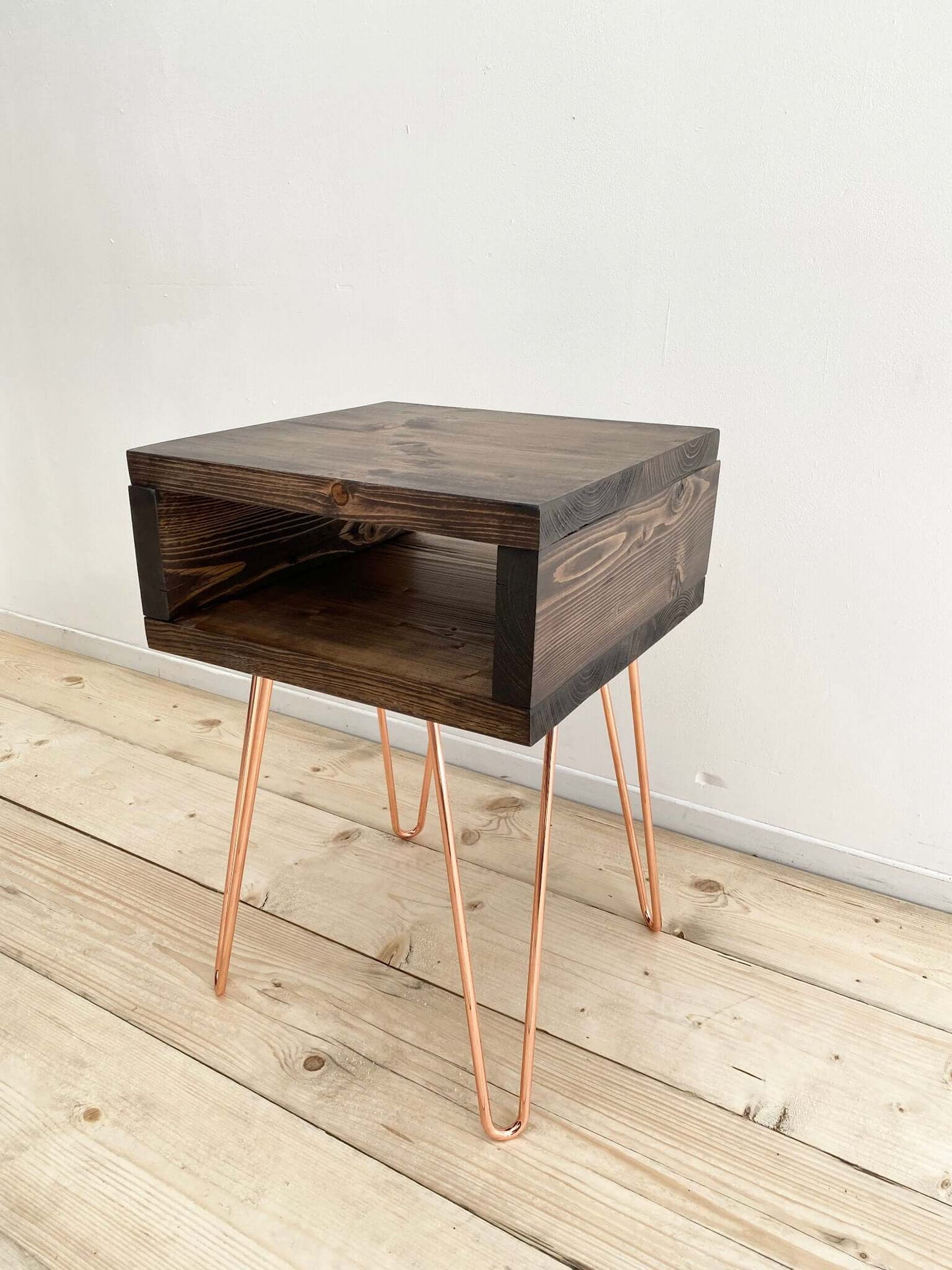 Reclaimed wood side table with hairpin legs.