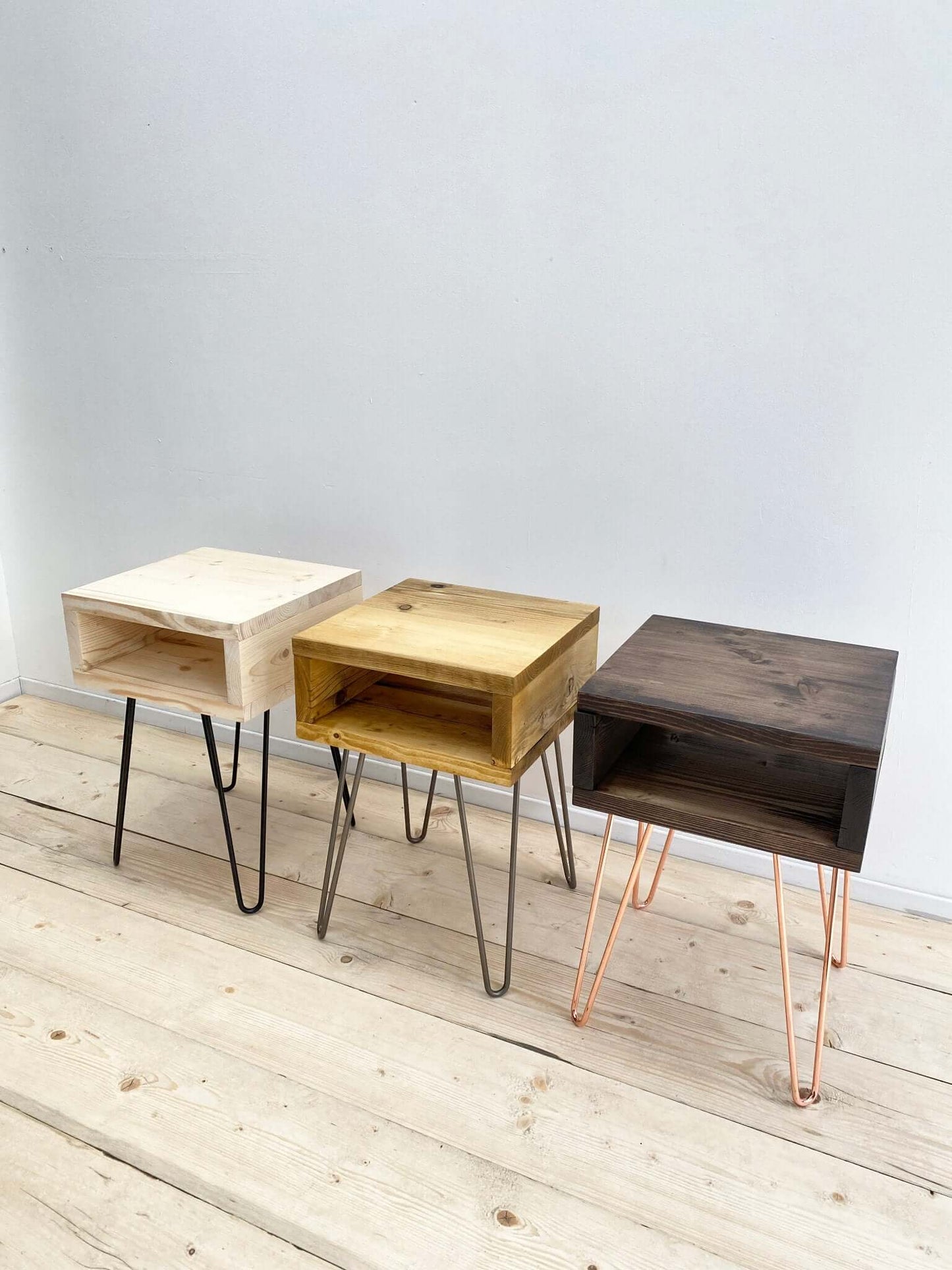 Reclaimed wood side table with hairpin legs.