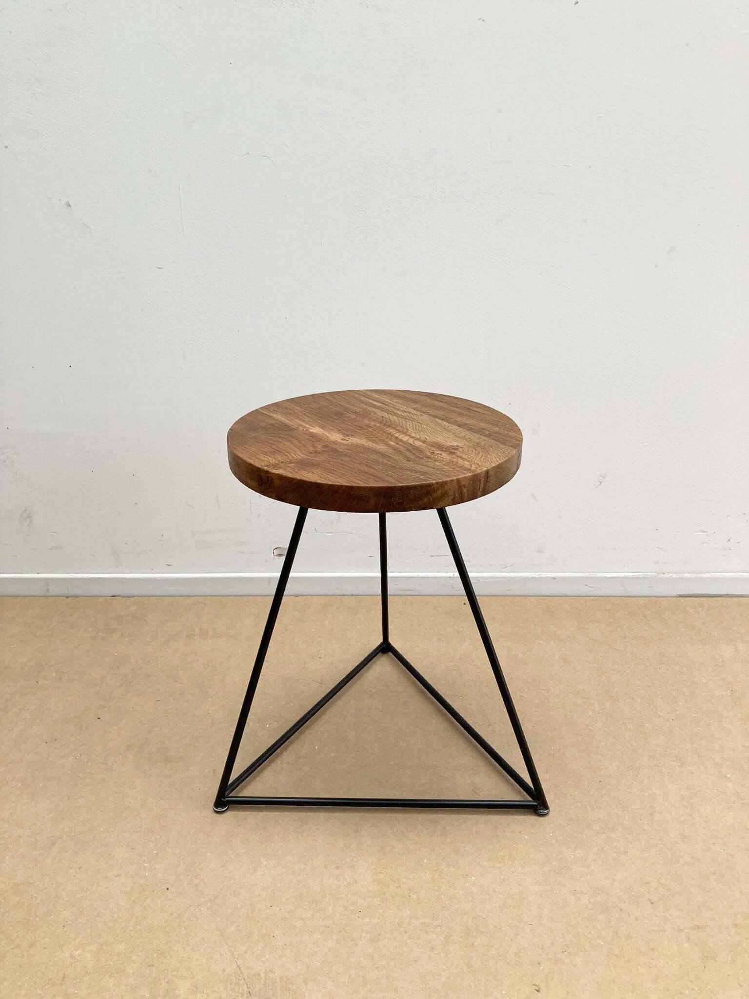 Hardwood stool with optional base.